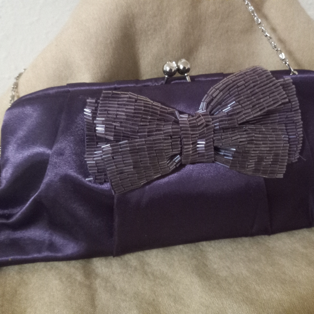Expression NYC brand, elegant evening bag, two tones of purple